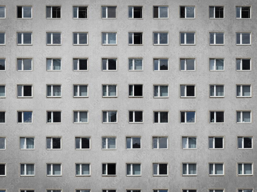 many windows on building facade - apartment block